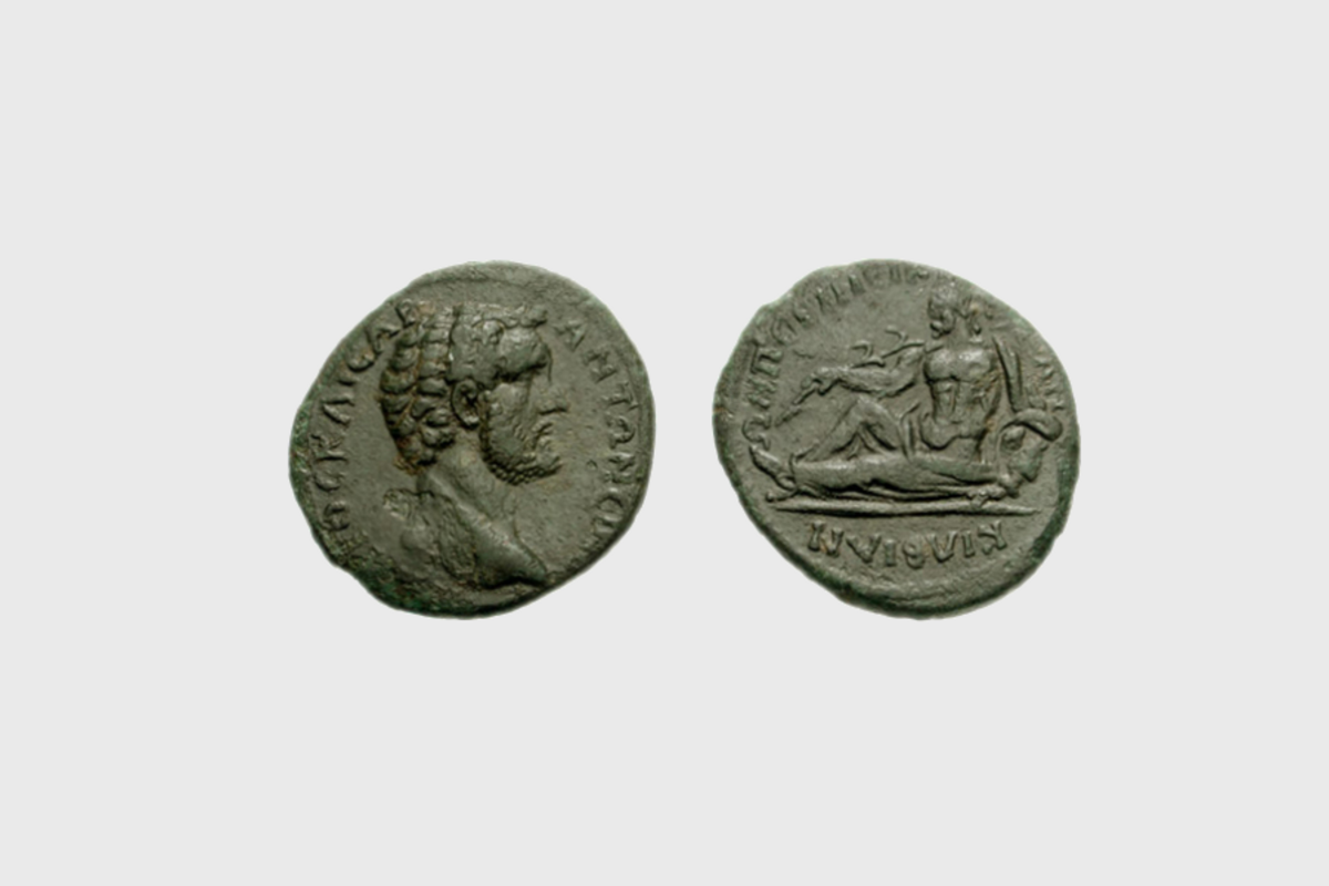 Vorder- und Rückseite einer antiken Münze